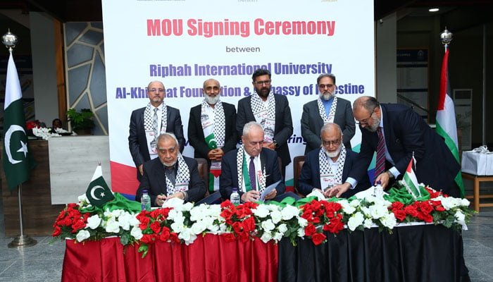 Ahmed Jawad A A. Rabei, ambassador of the State of Palestine (C), VC Riphah University Prof. Dr Anis Ahmed (L) and Dr Hafeez ur Rehman President AKF sign an MOU during an MOU signing ceremony at Riphah International University on April 23, 2024. — Facebook/Alkhidmat Foundation Pakistan