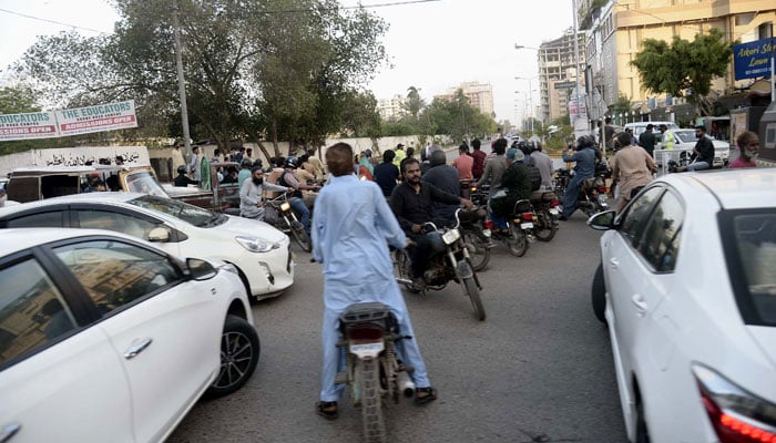 Commuters worry and facing problems due to closing major roads and security reasons on the arrival of Iranian President Dr Ebrahim Raisi, at Saddar in Karachi on April 23, 2024. — PPI