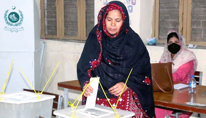 The ballot casting process is underway at a polling station during the by-election in NA-119 and PP-147 constituencies, in Lahore on Sunday, April 21, 2024. — PPI