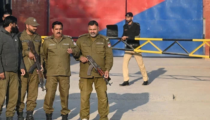 A representational image showing Punjab Police personnel standing guard. — AFP/File