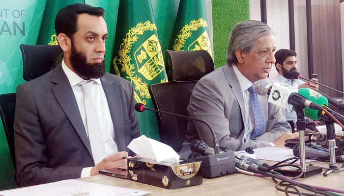 Minister for Law and Justice Azam Nazeer Tarar (right) pictured alongside Federal Minister for Information and Broadcasting Attaullah Tarar, during a press conference in Islamabad on April 23, 2024. — PID