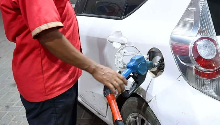 A fuel station worker fills petrol in a vehicle in Karachi on October 01, 2022. — PPI