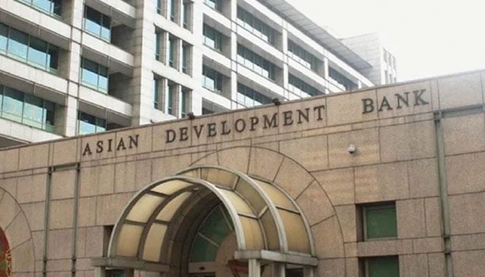 Asian Development Bank (ADB) can be seen written on the building in Ortigas City, Philippines. — AFP/File