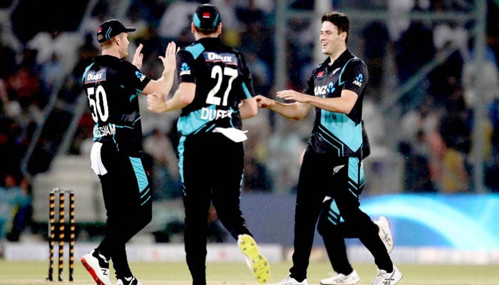 New Zealand’s pacer William O’Rourke celebrates the wicket of Pakistan batter Saim Ayub with his teammates during the Fourth Twenty20 International Cricket Match between Pakistan and New Zealand at the Qaddafi Cricket Stadium on April 25, 2024. — APP