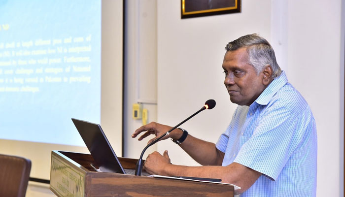 The image released on Oct 20, 2023 shows Dr Moonis Ahmar giving a lecture. — Facebook/moonis.ahmar