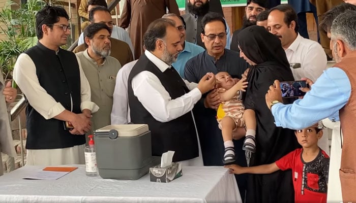 KP Health Minister Syed Qasim Ali Shah on Friday inaugurated the polio eradication campaign by administering polio drops to a child at the Police Services Hospital here on April 26, 2024. — Facebook/SQasimAliShah