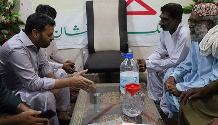 Muttahida Qaumi Movement-Pakistan (MQM-P) Senior Deputy Convener Mustafa Kamal (left) meets logal government officials in Karachi in this image released on April 18, 2024. — X/@MQMPUpdates