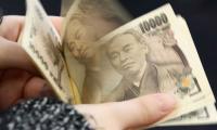 Yen sinks to 34-year low after Bank of Japan holds interest rates near zero