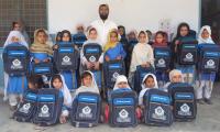 School bags distributed among poor kids