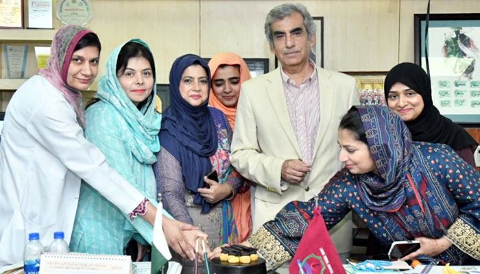 Principal Prof Dr Al-Fareed Zafar pictured along female staff promoted to the rank of professor in this image released on April 27, 2024. — Facebook/Lahroe General Hospital