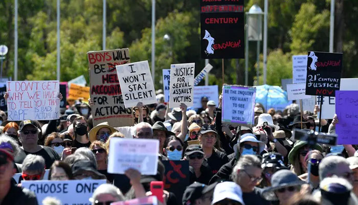 Protesters attend a rally against sexual violence and gender inequality in Australia. — AFP/File