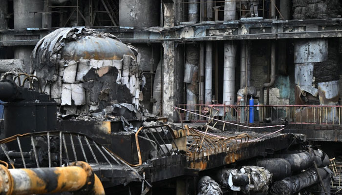 This image shows the debris in a turbine hall full of scorched equipment at a power plant of energy provider DTEK in an undisclosed location in Ukraine on April 19, 2024. — AFP