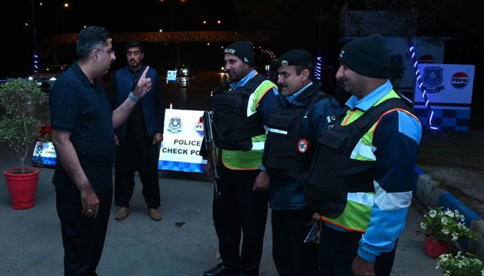 Inspector General of Police (IGP) Islamabad, Syed Ali Nasir Rizvi interacts with police personnel during a search operation in Islamabad on April 28, 2024. — Facebook/Islamabad Police