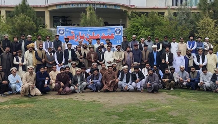 Representational image shows participants pose for a group photo at an Eid Milan party on April 13, 2024. — Facebook/WAWA- Wana Welfare Association Official