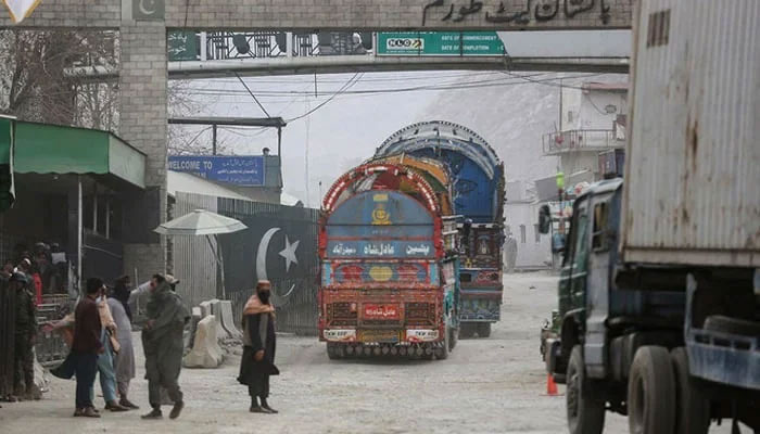 Goods carrier trucks cross into Pakistan at the zero point Torkham border crossing between Afghanistan and Pakistan, in Nangarhar province. — AFP/File