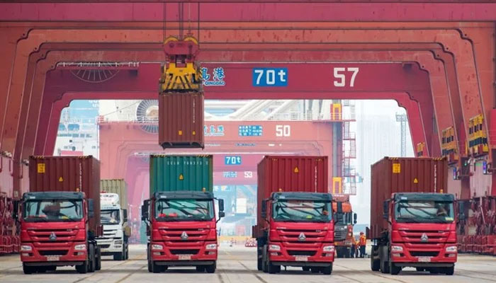 A representational image of containers being loaded onto trucks at a Chinese port. — AFP/File