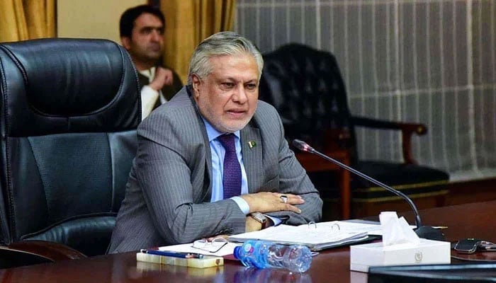 Foreign Minister and newly appointed Deputy PM Ishaq Dar chairing a meeting in this undated picture. — APP/File