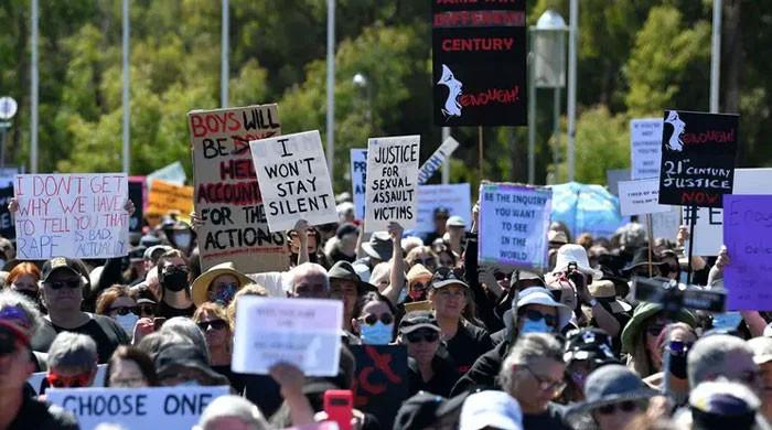 Albanese calls gender violence ‘a national crisis’ as thousands rally in Australia