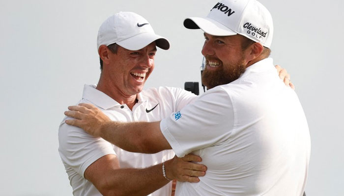 Rory McIlroy and Shane Lowry celebrate after winning the Zurich Classic at TPC Louisiana. — AFP/File