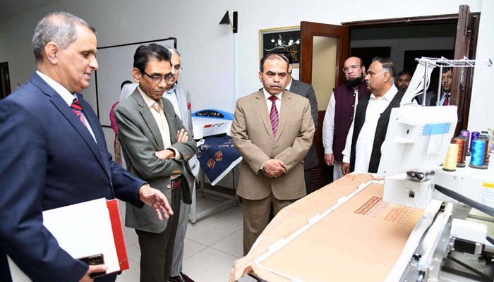 Federal Minister for Science and Technology Khalid Maqbool Siddiqui being briefed about departments at NUTECH University on April 30, 2024. — APP