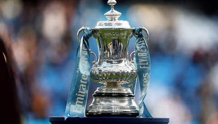 The FA Cup trophy is displayed inside the Etihad Stadium on January 7, 2024. — AFP
