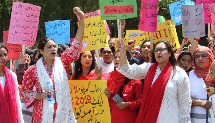 Women from different labour organization participating in a rally outside the Press Club on the occasion of International Labour Day on May 1, 2024. — APP