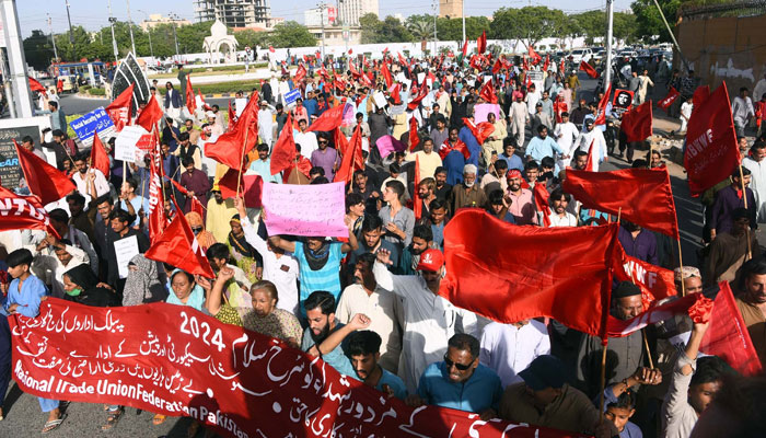 Members of the National Trade Union Federation (NTUF) hold a protest to present tribute to martyrs of Chicago on the occasion of International Labour Day in Karachi on May 1, 2024. — PPI