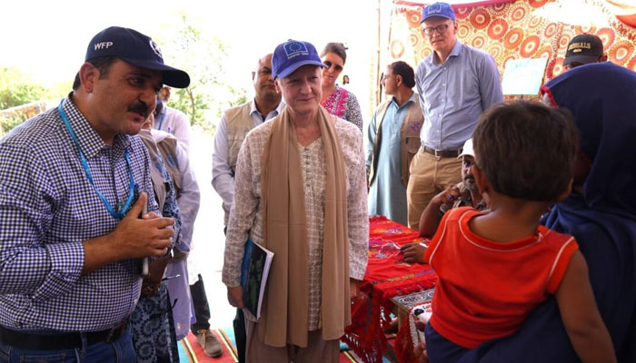 Ambassador of the European Union to Pakistan, Dr Riina Kionka speaks to a woman at Dadu on April 30, 2024. — APP