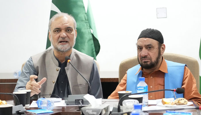 Jamaat-e-Islami emir Hafiz Naeem ur Rehman (L) addresses an event at Mansoorah on May 1, 2024. — Facebook/Hafiz Naeem ur Rehman