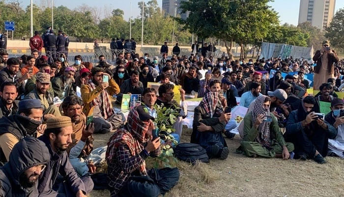 The representational image shows protesters sits in front of the Press Club in Islamabad. —x/Khushal_Khattak/File