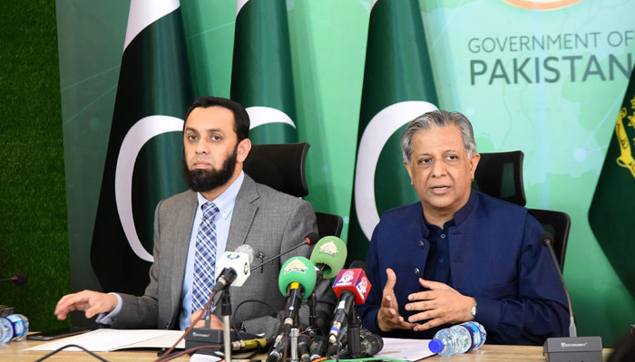 Minister for Law and Justice Senator Azam Nazeer Tarar (right) and Federal Minister for Information and Broadcasting Attaullah Tarar hold a press conference on May 2, 2024. — PID