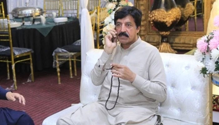 PPP leader and Punjab govenor-elect Sardar Saleem Haider Khan is talking on cellphone in this image posted on his Facebook page on April 30, 2024. —Facebook/ Sardar Saleem Haider Khan