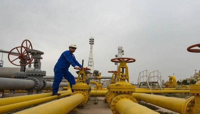 A representational image showing A technician working at a gas field. — AFP/File