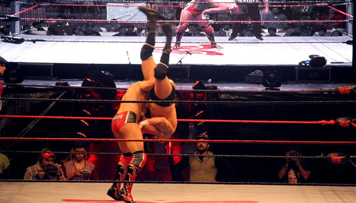 A srestling match in Karachi Pakistan seen in this undated photo.— WWE/File