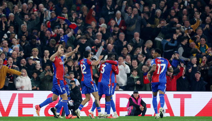Crystal Palaces Tyrick Mitchell celebrates scoring their third goal with teammates during Crystal Palace vs Manchester Uniteds Premier League match at Selhurst Park, London, Britain  on May 6, 2024.  — Reuters