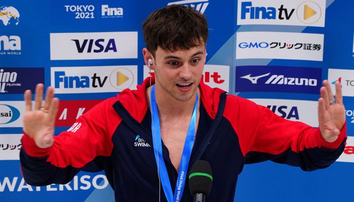 Britains gold medallist diver Tom Daley gestures during an interview after winning the mens 10m platform final. —Reuters/File