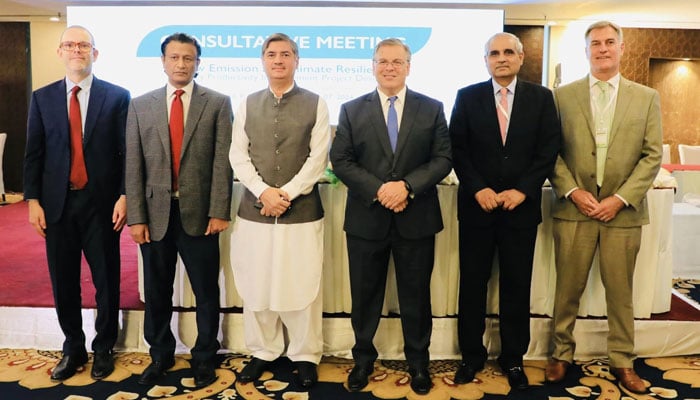 US Ambassador Donald Blome (C) poses for a group photo with other participants during a workshop on May 7, 2024. — Facebook/USAID Pakistan