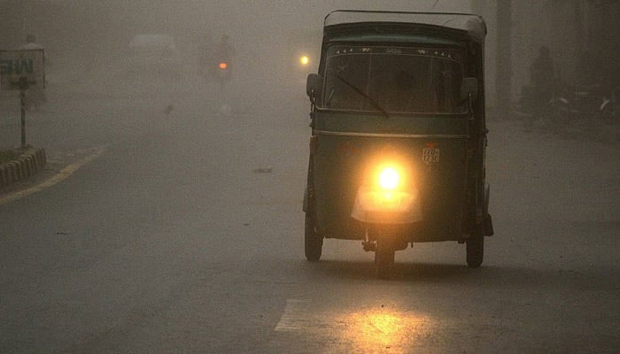 A view of a dust storm before rain in Multan. — APP/File