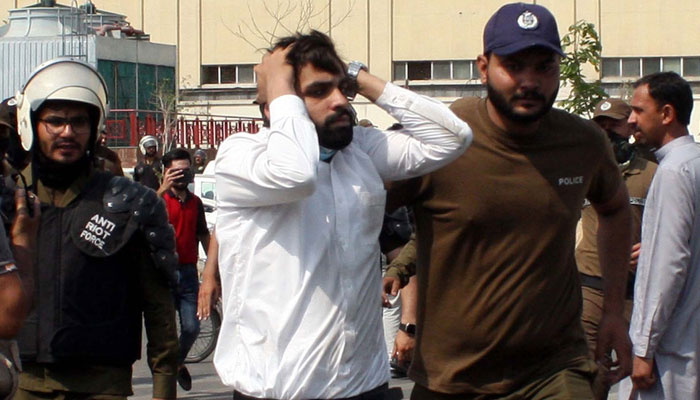 Police personnel resort to baton charge, using tear gas and water cannon as they arrest lawyers protesting at  Lahores GPO Chowk on May 8, 2024. — PPI
