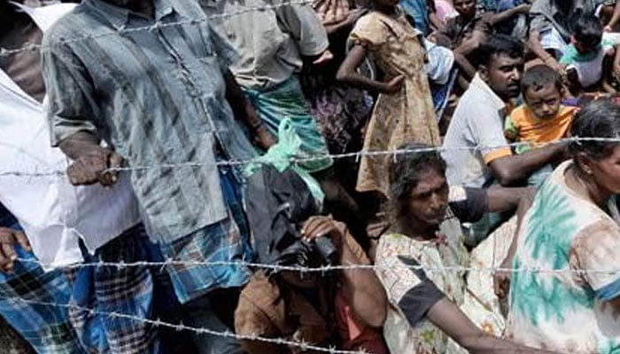 Tamil refugees seen in this undated photo. — AFP/File
