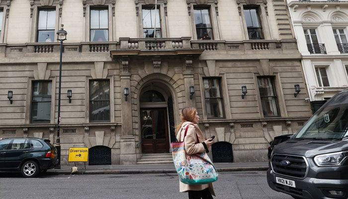 A person walks past the entrance to the Garrick Club, a private members club in London, Britain, April 4, 2024.— Reuters