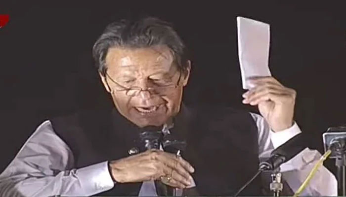 The screenshot shows former prime minister Imran Khan brandishing a letter during a rally in Parade Ground, Islamabad, on March 27, 2023. — YouTube/GeoNews