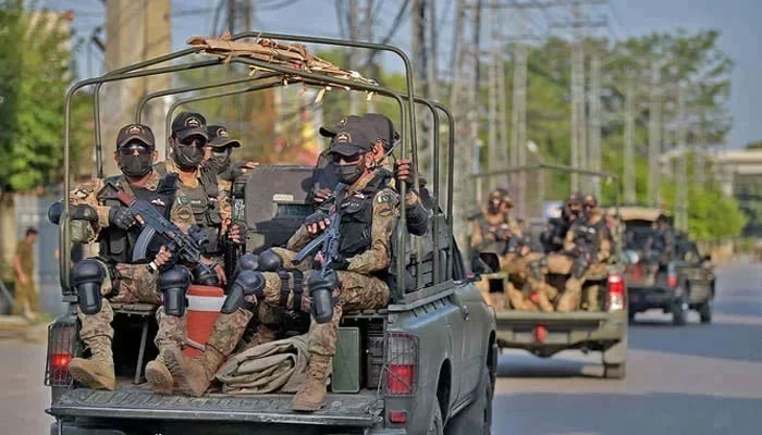 Pakistan Army commandos depart in their vehicles. — AFP/File