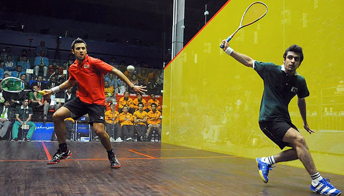 Squash players in action in this undated photo. — PSF/File