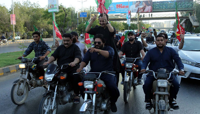 Activists of Tehreek-e-Insaf (PTI) hold a protest rally for the release of PTI Founder Imran Khan led by Haleem Adil Shaikh, PTI Sindh President in Karachi on May 9, 2024. — PPI
