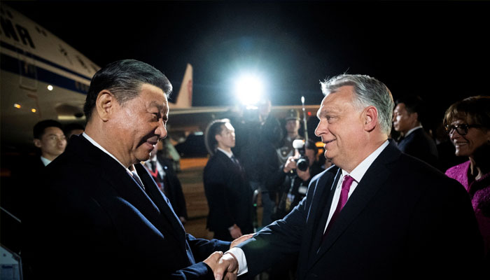 Hungarian Prime Minister Viktor Orban welcomes Chinese President Xi Jinping at the Ferenc Liszt International Airport in Budapest, Hungary, May 8, 2024. — Reuters