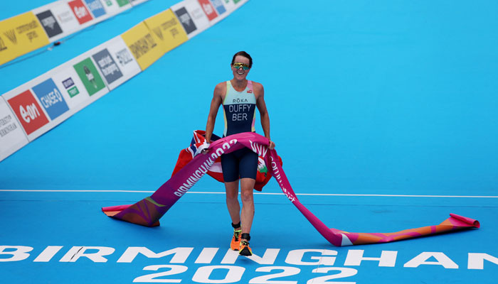 Bermudas Flora Duffy crosses the line to win the womens individual sprint distance final. — Reuters/File