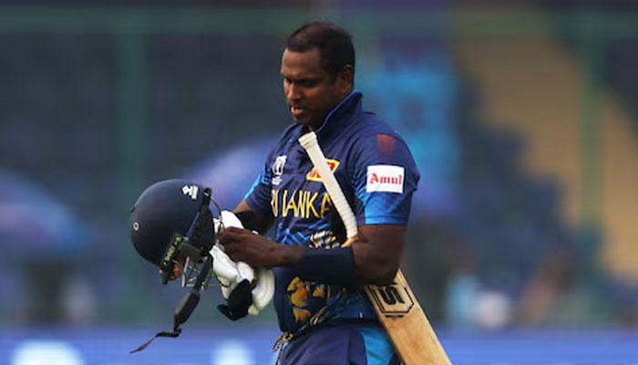 Sri Lankas Angelo Mathews walks after losing his wicket due to time out.— Reuters/File