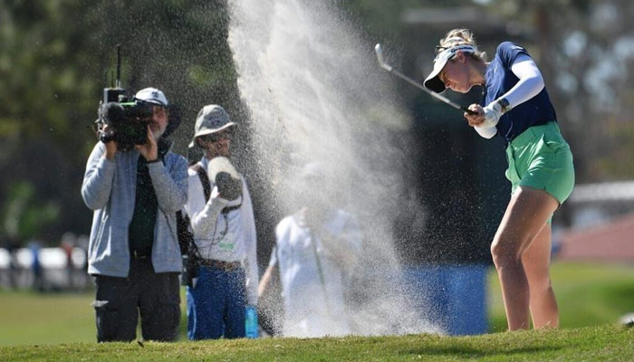 Nelly Korda hits out of a fairway bunker on the 17th hole at Januarys LPGA Drive On Championship at the Bradenton Country Club. — USA TODAY
