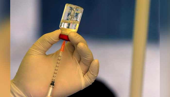 This representational image shows a health worker preparing to administer the vaccine. — Reuters/File